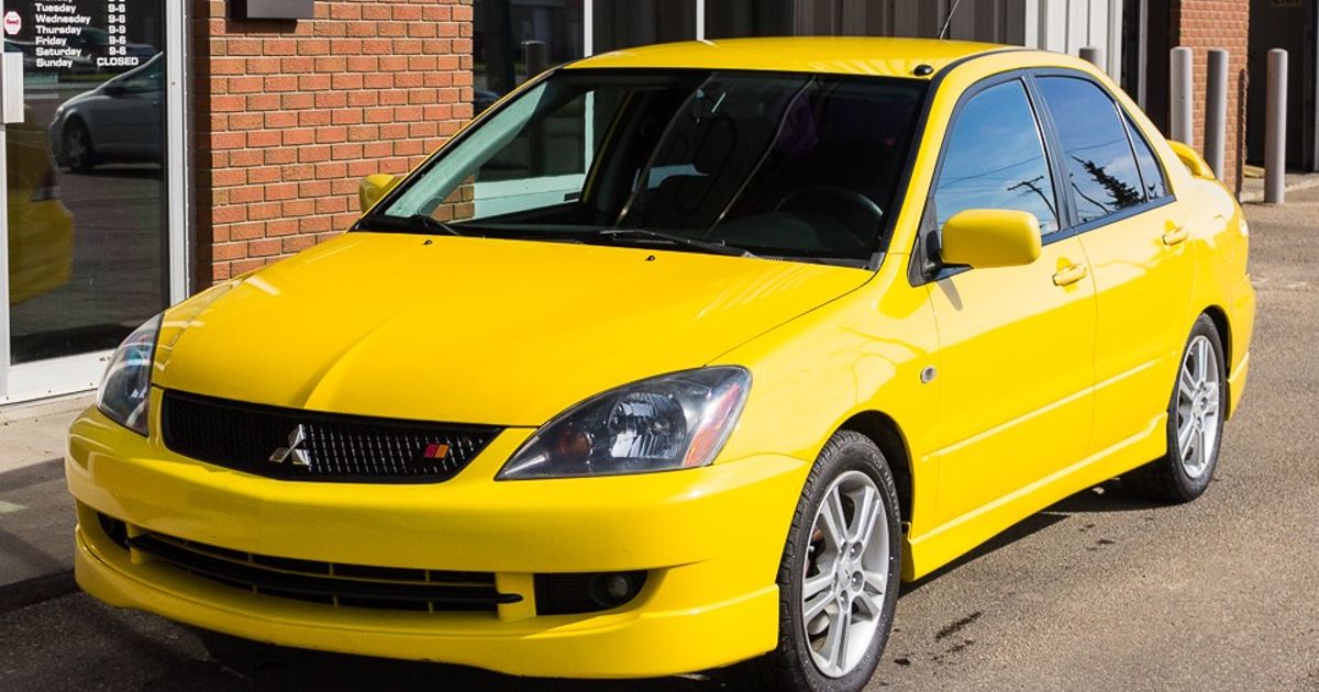 9 желтых. Mitsubishi Lancer 2006. Lancer 9 Ralliart. Lancer 9 Ralliart 2.4. Митсубиси Лансер 9 раллиарт.