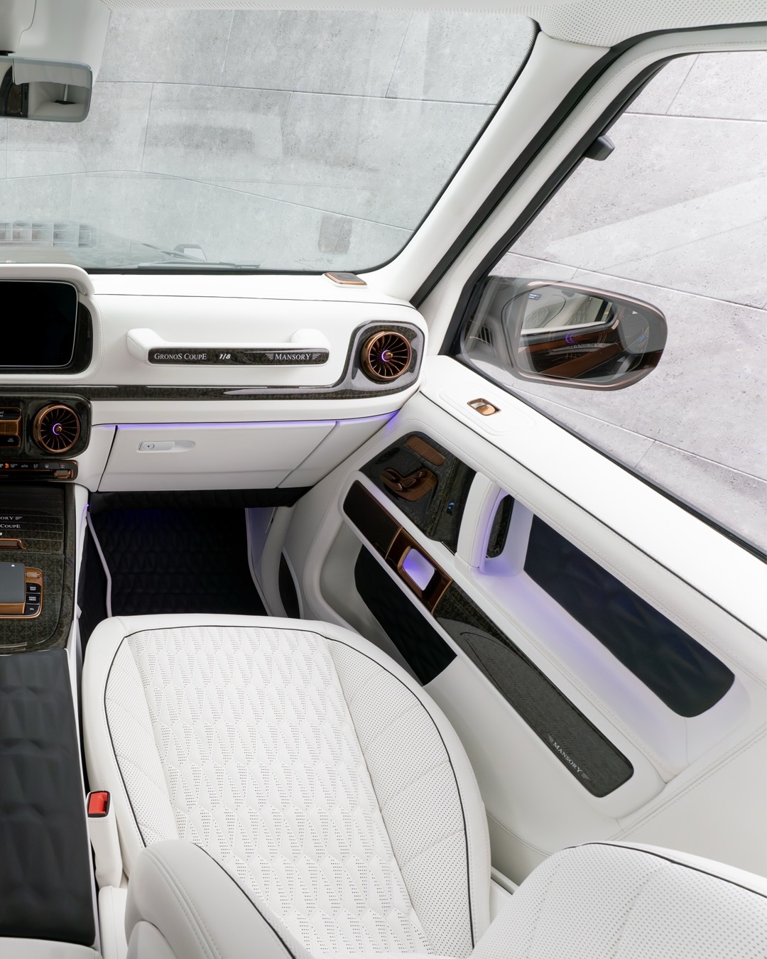 Mansory перетворив Mercedes G-Class на епатажне купе з «суїцидальними» дверима - фото 7